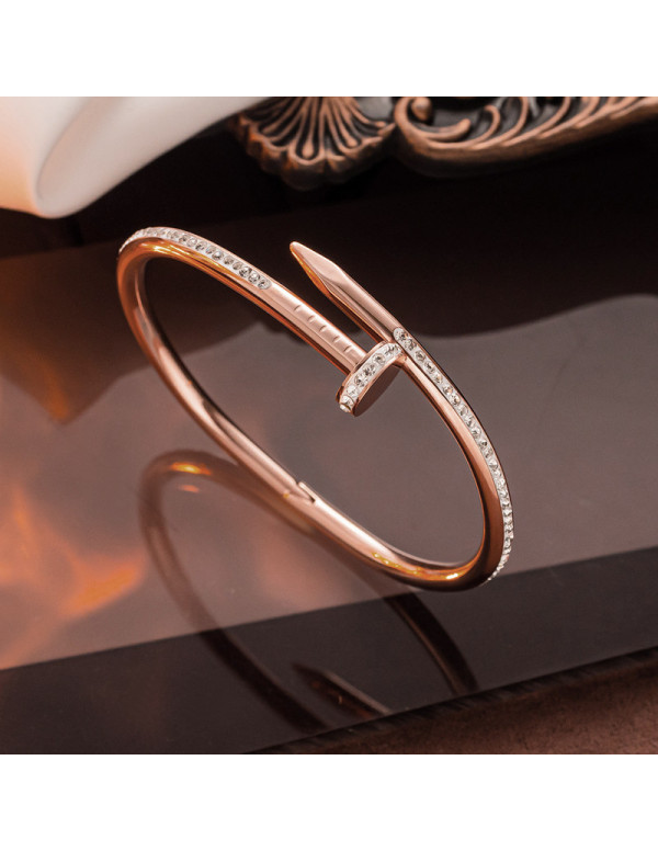 Jewels Galaxy Rose Gold Plated Stainless Steel Anti Tarnish AD Studded Nail Bracelet