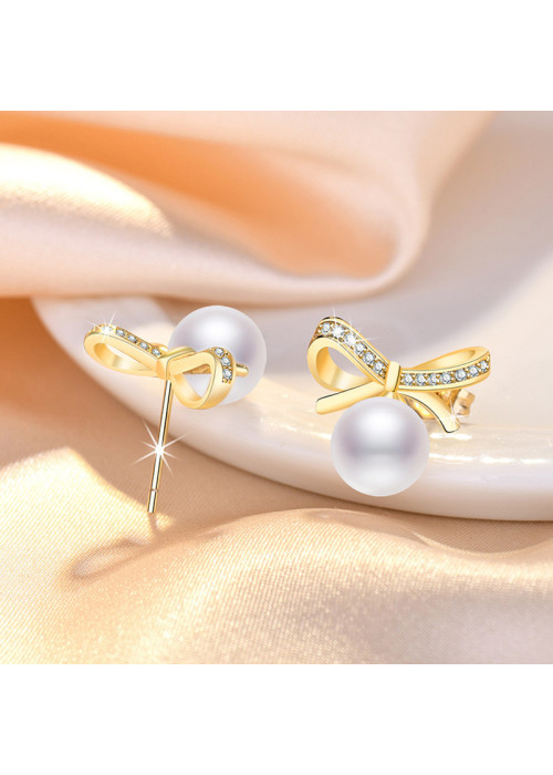 Jewels Galaxy Gold Plated American Diamond Studded Bow-Tie Shape Korean Stud Earrings